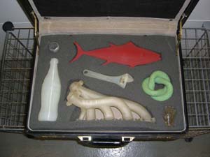 Sample items manufactured in early 3D printers in the 1990s